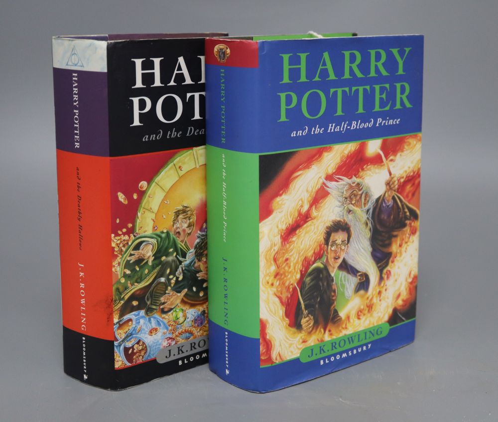 Two Harry Potter books: Harry Potter and the Half Blood Prince and Harry Pottery and the Deathly Hallows